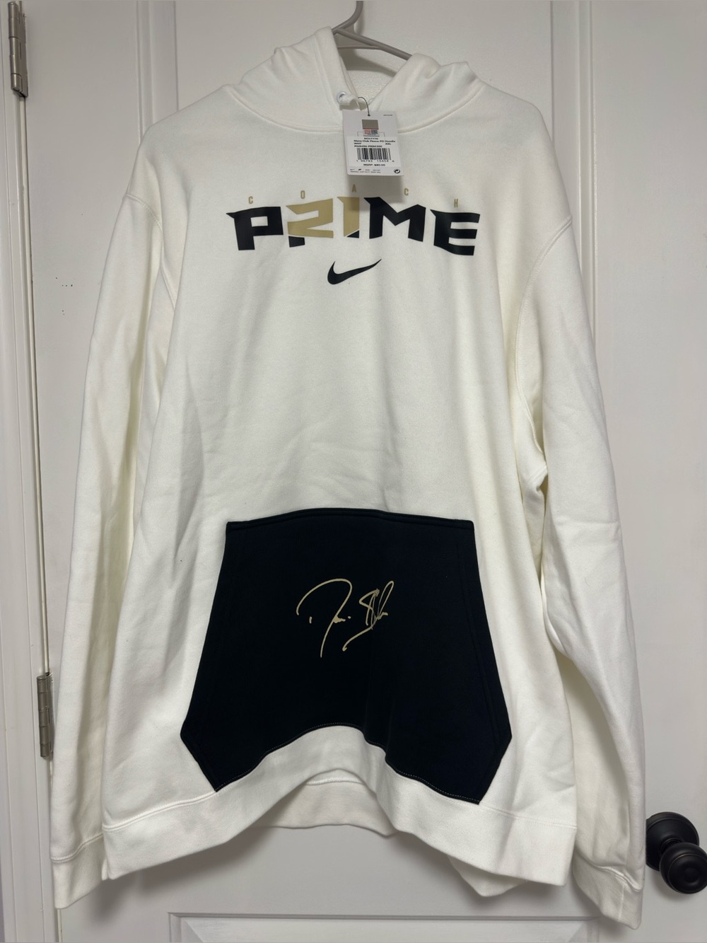 Nike White Crewneck Hoodie with Black Pocket and Gold Accents